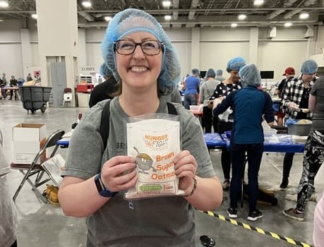 Making meal kits at the Silicon Slopes Summit Fight Hunger service project.