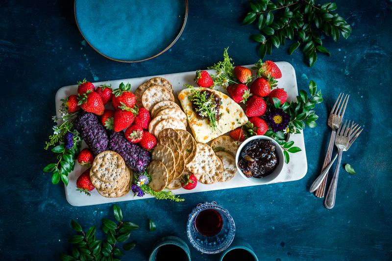 strawberries, cheese, and crackers