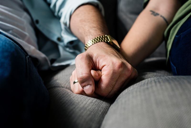 Couple holding hands