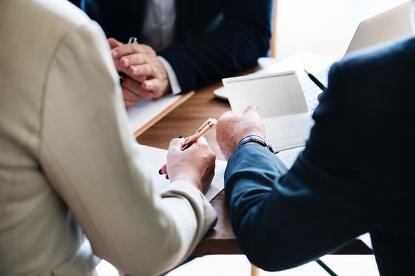 People meeting with a finance professional