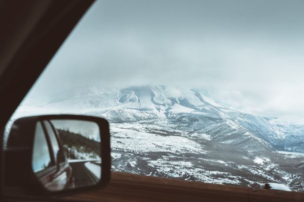 Snowy Mountain Through a Car Window