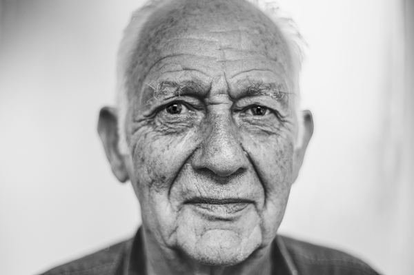 elderly man looking sad