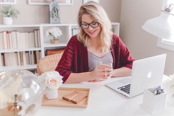 Woman typing on laptop